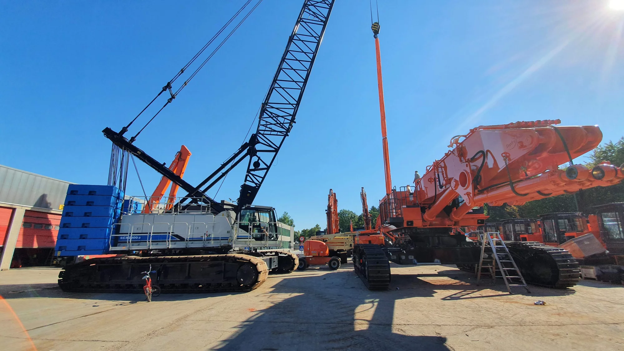 EX1200-6 on its way on 10 trucks to the South of France